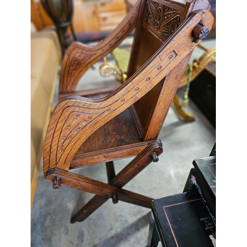 83 - Oak carved Glastonbury style chair