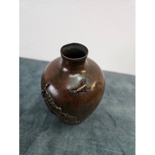 374 - A Japanese bronze diminutive vase with woven detail