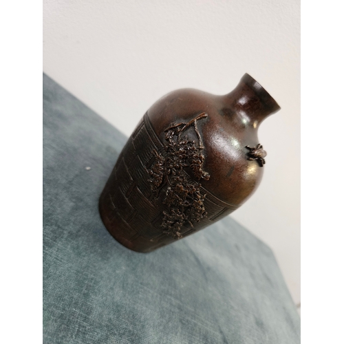 374 - A Japanese bronze diminutive vase with woven detail