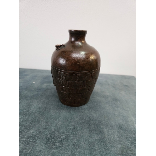 374 - A Japanese bronze diminutive vase with woven detail