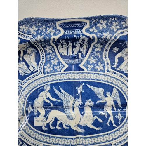 387 - A 19th century blue and white pearlware meat dish decorated with Greek classical figures and scenes