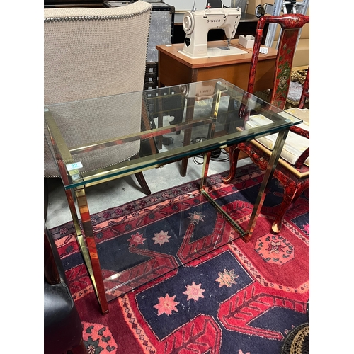 32 - High end designer glass and brass console table/ desk