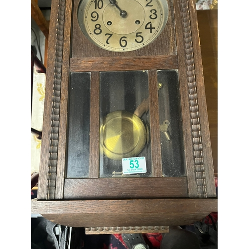 53 - 1930's wall clock with pendulum and key