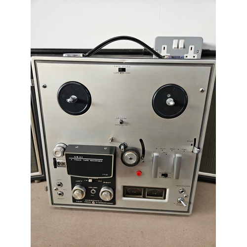 459 - Akai 1710 4 Track Tape Recorder - reel to reel 
With speakers 
Appears to be working