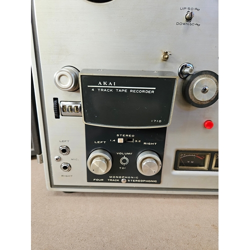 459 - Akai 1710 4 Track Tape Recorder - reel to reel 
With speakers 
Appears to be working