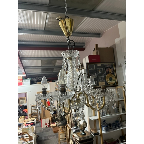 494 - Crystal and brass chandelier