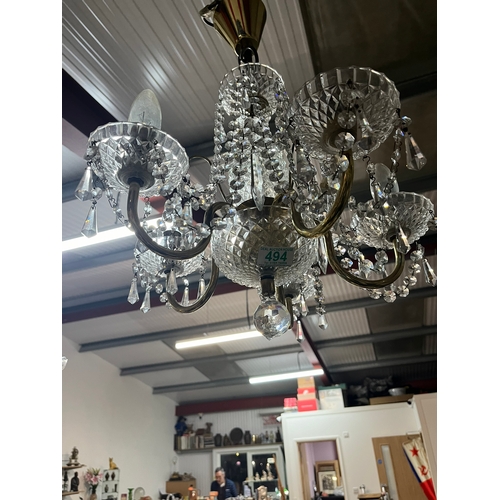 494 - Crystal and brass chandelier