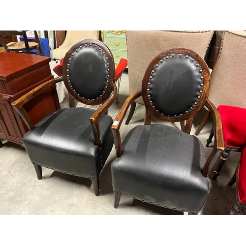 2 - Pair of black leather armchairs with brass stud details