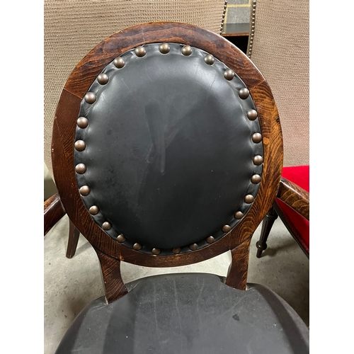 2 - Pair of black leather armchairs with brass stud details