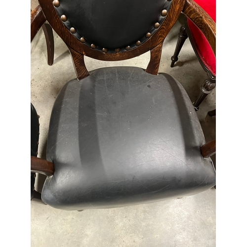 2 - Pair of black leather armchairs with brass stud details