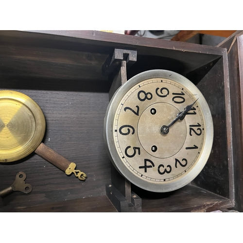 53 - 1930's wall clock with pendulum and key