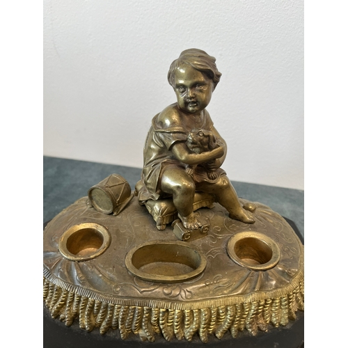 163 - Antique bronze model of a child with toys and dog. On a marble base