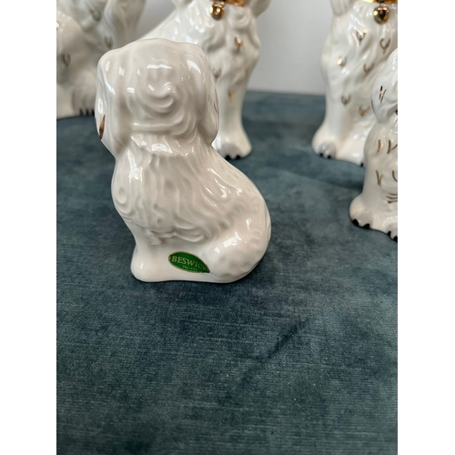 167 - 6 x graduated size Beswick Staffordshire flatback style dogs. 
Pair of large, medium and small dogs.... 