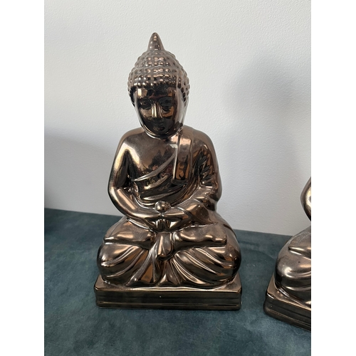 168 - Modern pottery Buddha's

28cm high x 16cm wide