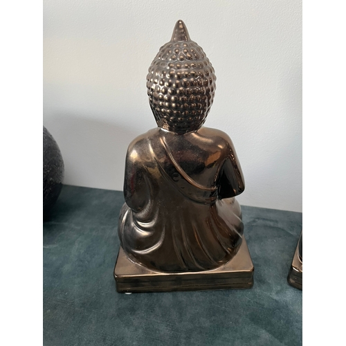 168 - Modern pottery Buddha's

28cm high x 16cm wide