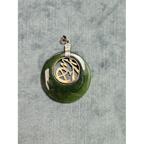 542 - Silver and jade necklace pendant