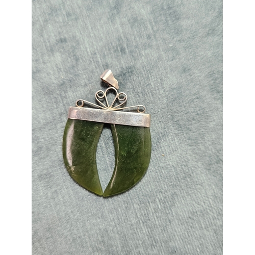 543 - Silver and jade necklace pendant