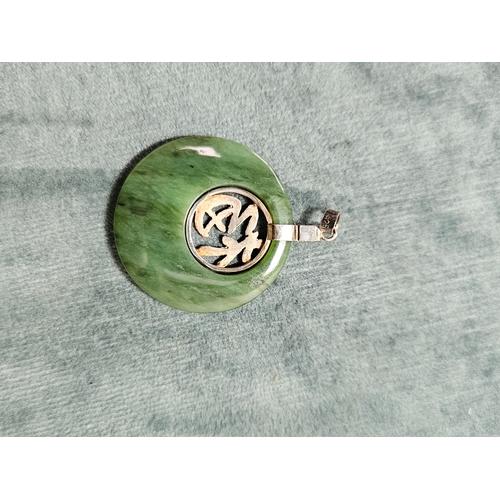 545 - Silver and jade necklace pendant