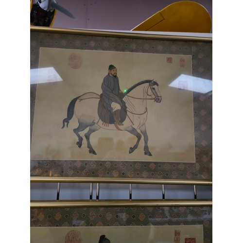 716 - Pair of Chinese watercolours on silk, each depicting a man on horseback