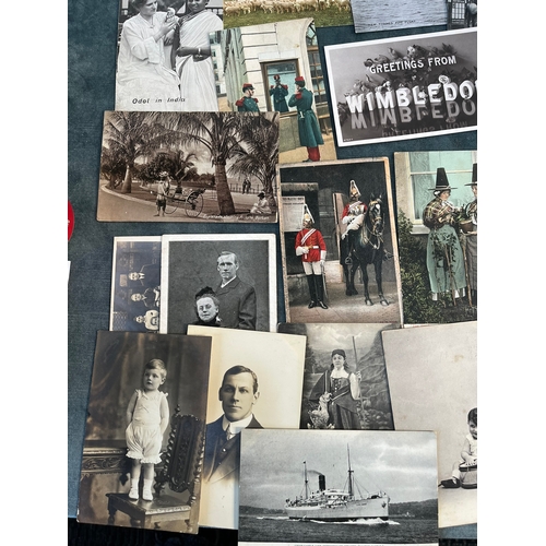 194 - Large lot of approximately 100 antique postcards - Ypres, train stations, Fire Engines, African.