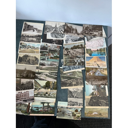 194 - Large lot of approximately 100 antique postcards - Ypres, train stations, Fire Engines, African.