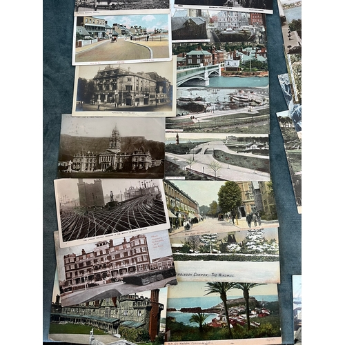 194 - Large lot of approximately 100 antique postcards - Ypres, train stations, Fire Engines, African.