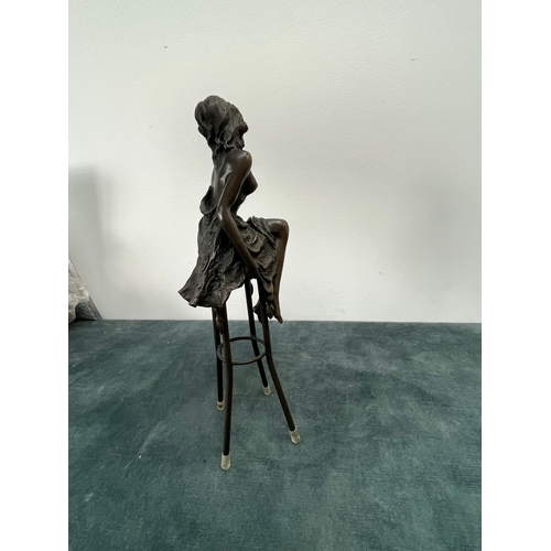 259 - Art Deco style bronze modelled as a bare chested female figure, seated upon a chair, signed 'Pierre ... 