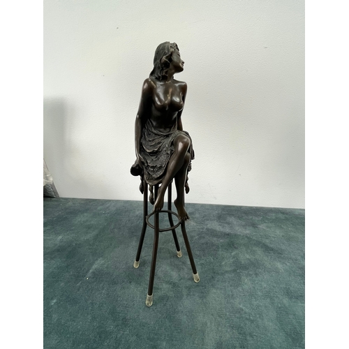 259 - Art Deco style bronze modelled as a bare chested female figure, seated upon a chair, signed 'Pierre ... 