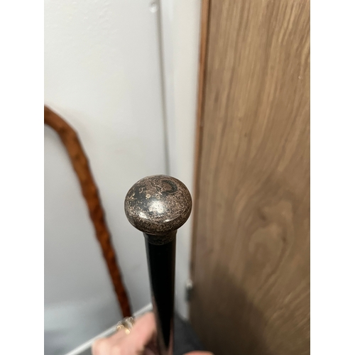 319 - Silver topped walking stick and walking stick with cabochon