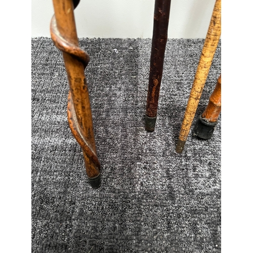 320 - Group of 5 walking sticks