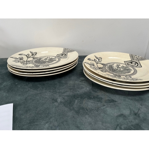 323 - 8 x antique plates decorated with stags