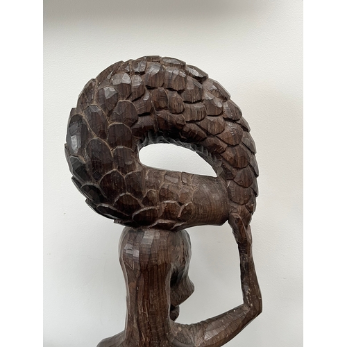 328 - Heavy carved African tribal fertility statue with pangolin