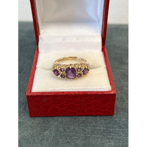 504 - Early victorian 9ct yellow gold ring. Set with purple amethysts 
Size L - 3.6g