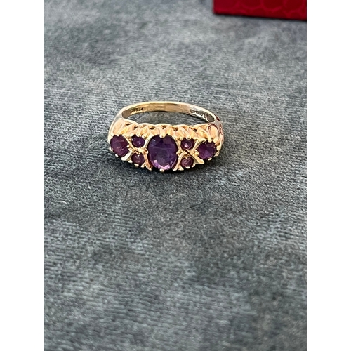 504 - Early victorian 9ct yellow gold ring. Set with purple amethysts 
Size L - 3.6g