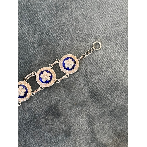 513 - Silver and enamel bracelet decorated with flowers