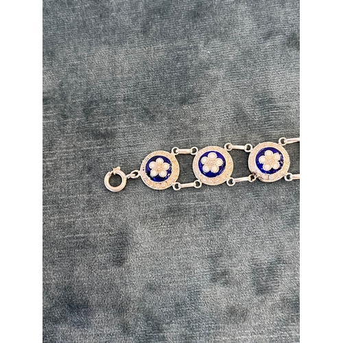 513 - Silver and enamel bracelet decorated with flowers