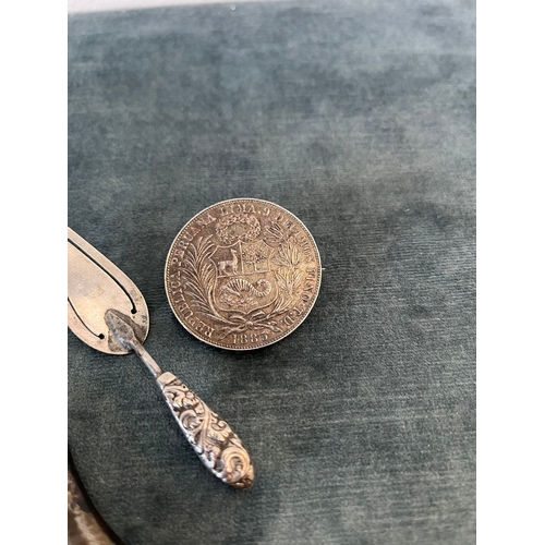 539 - Silver coin brooch, silver bookmark and silver handled file