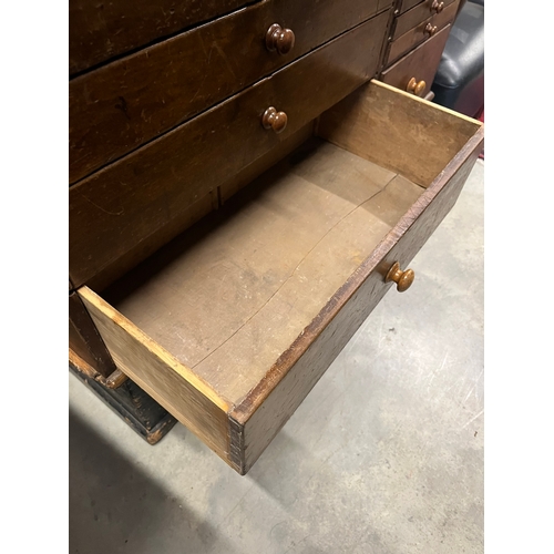 46 - Large antique chest of collectors drawers with a side cupboard