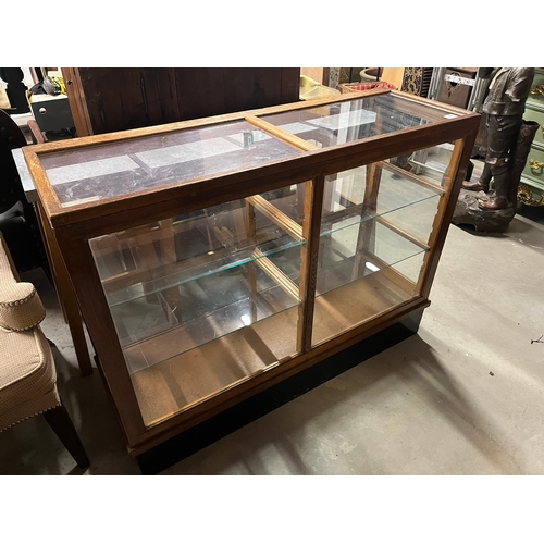 49 - Haberdashery type cupboard with glass shelves