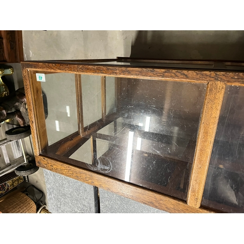 49 - Haberdashery type cupboard with glass shelves