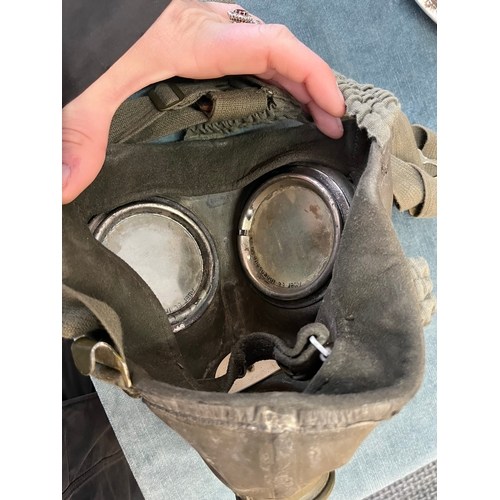 426 - British turtle helmet and German WWII gas mask