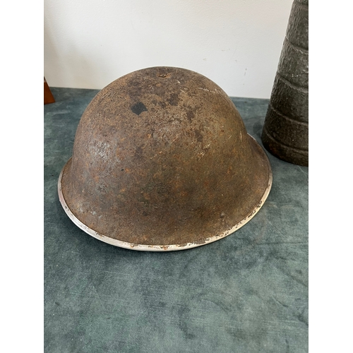 426 - British turtle helmet and German WWII gas mask