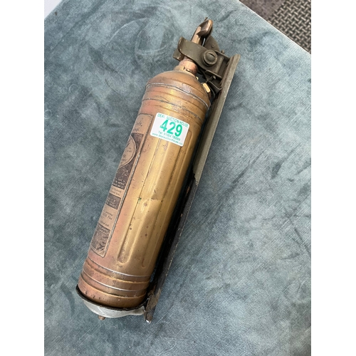 429 - Antique Pyrene fire extinguisher with wall mount