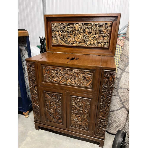 16 - Oriental carved drinks bar/ cabinet