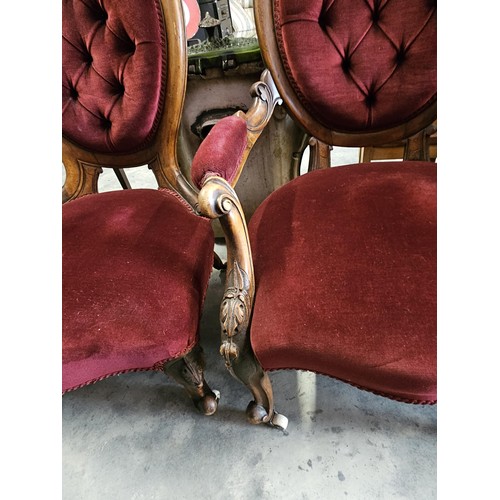 43 - Pair of red velvet mahogany arm chairs. His and Hers chairs. Button back