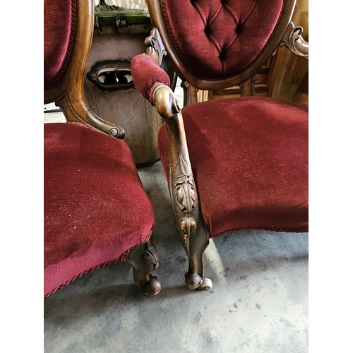 43 - Pair of red velvet mahogany arm chairs. His and Hers chairs. Button back