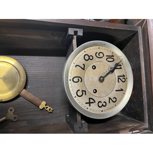 53 - 1930's wall clock with pendulum and key