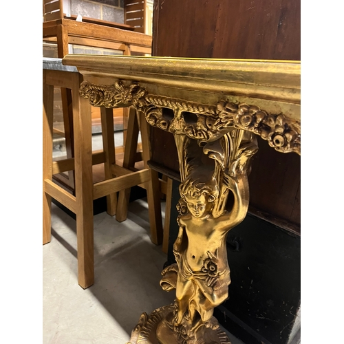 56 - Gold gilt cherub hall table with glass top