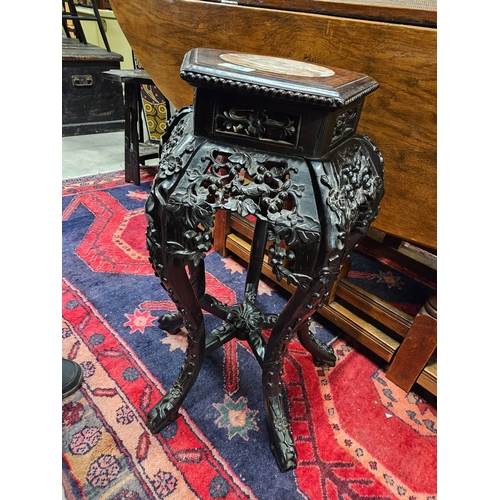 25 - Oriental carved hardwood and marble topped table