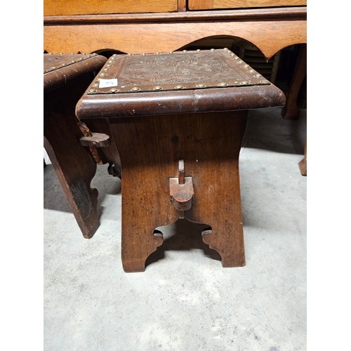 47 - Pair of antique leather topped stools